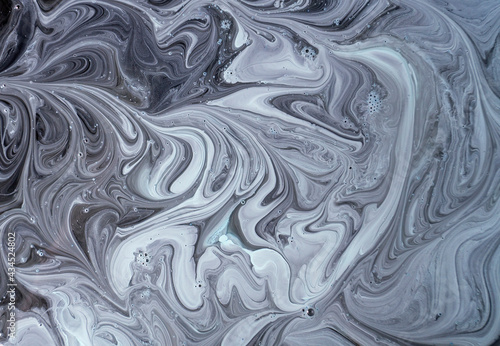 The colors of the aqueous ink are translucent. Abstract multicolored marble texture background