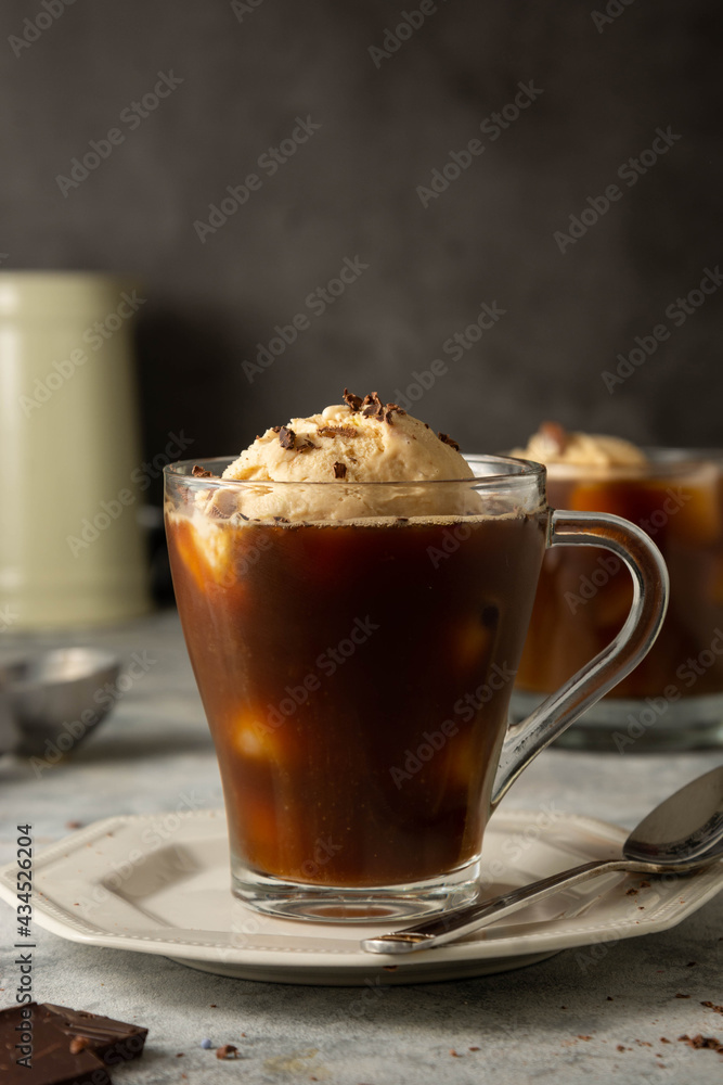 Ice cream with coffee in glass cup. Coffee affogato drink. Ice cream with coffee in glass cup. Coffee affogato drink.