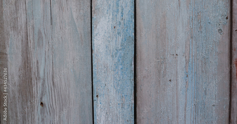 Old wooden surface with blue peeling paint Old wooden surface with blue peeling paint