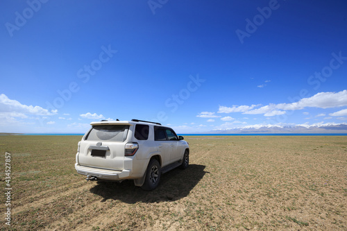 Off road car on the lakeside in tibet,China © lzf