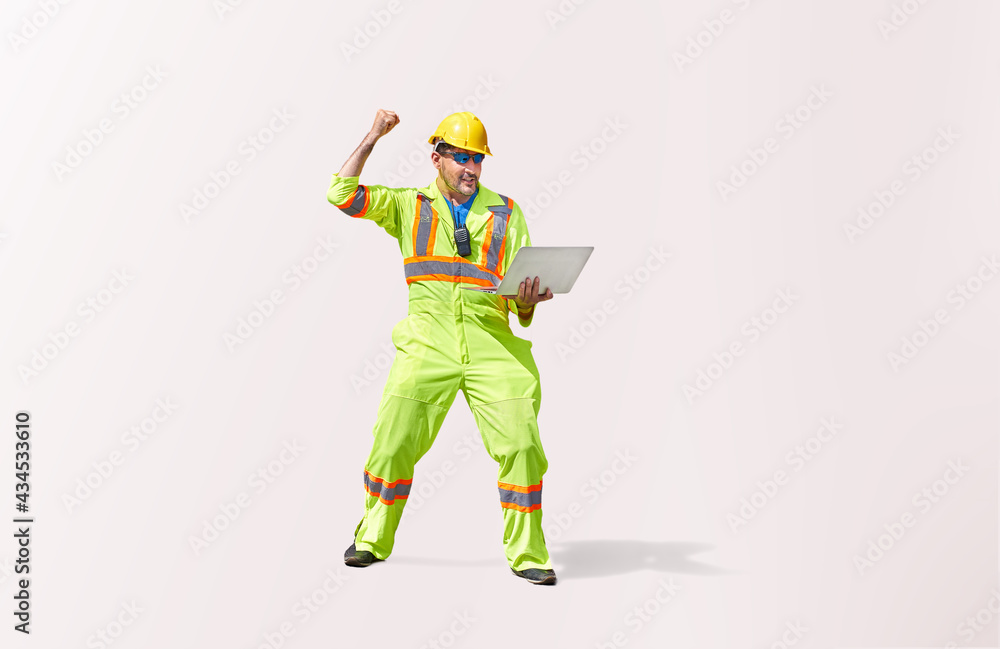 Engineering man holp laptop and lay right arm up for happy and success action on white isolate with selective path Engineering man holp laptop and lay right arm up for happy and success action on white isolate with selective path