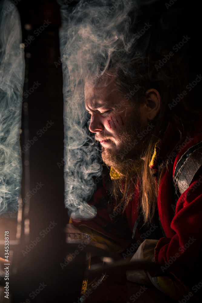 Witcher in a bar with smoke drinking beer Witcher in a bar with smoke drinking beer