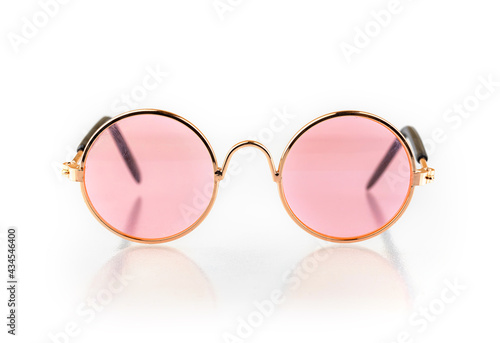 Stylish pink glasses isolated on white background