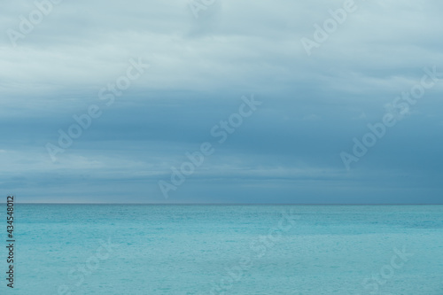 Cloudy stormy weather with sea and skyline at french riviera on rainy day. Horizontal high quality photography. Storm approaching the sea in Nice, France. High quality photo  © boytsov