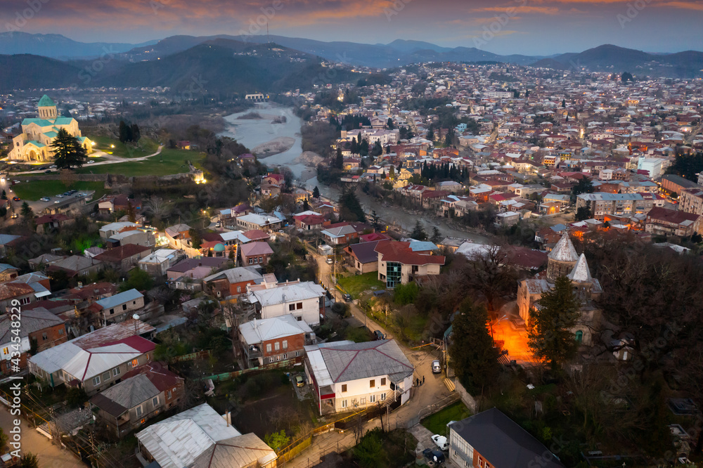 Evening top view of the historic city of Kutaisi, located on the two banks of the Rioni River, Georgia