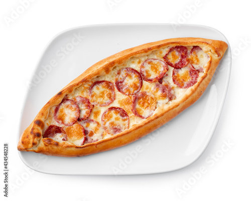 Turkish boat-shaped flatbread pide isolated on white