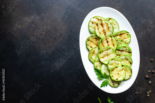 grilled zucchini summer menu vegetables appetizer on the table keto or paleo diet veggie vegan or vegetarian food healthy food meal snack copy space food background rustic. top view