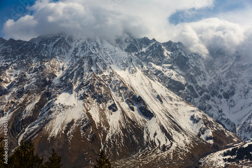 Beautiful mountain landscape of snowy Greater Caucasus ridge at winter sunny day, Georgia © JackF