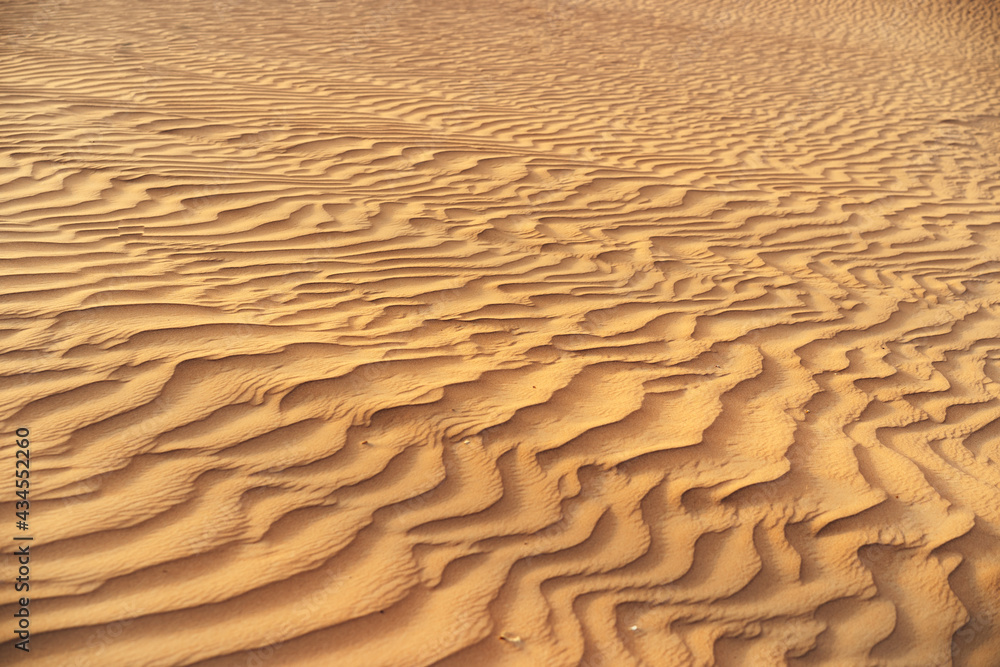 Wavy sand texture in Dubai desert close up Wavy sand texture in Dubai desert close up