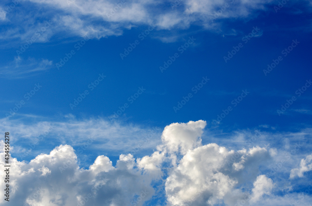 Naklejka premium White clouds in blue sky