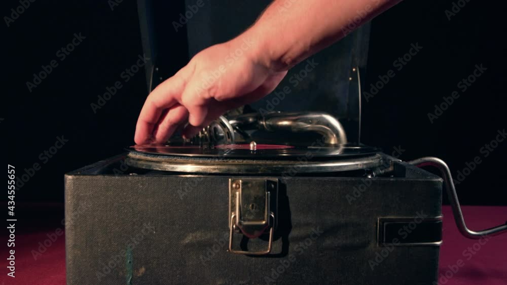 A gramophone is a portable gramophone, a mechanical device for playing gramophone records. The gramophone has a small horn built into the body, the device itself looks like a suitcase. A gramophone is a portable gramophone, a mechanical device for playing gramophone records. The gramophone has a small horn built into the body, the device itself looks like a suitcase.