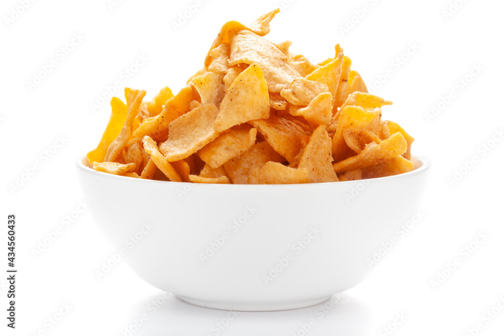 Close up of Soya Chips crunchy and salty Indian Namkeen on a ceramic white bowl. Close up of Soya Chips crunchy and salty Indian Namkeen on a ceramic white bowl.