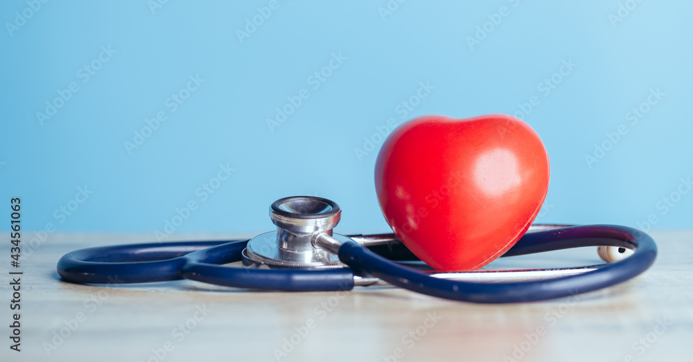 Stethoscope and a red heart. Concepts of a physical examination and Insurance health live concept. Stethoscope and a red heart. Concepts of a physical examination and Insurance health live concept.