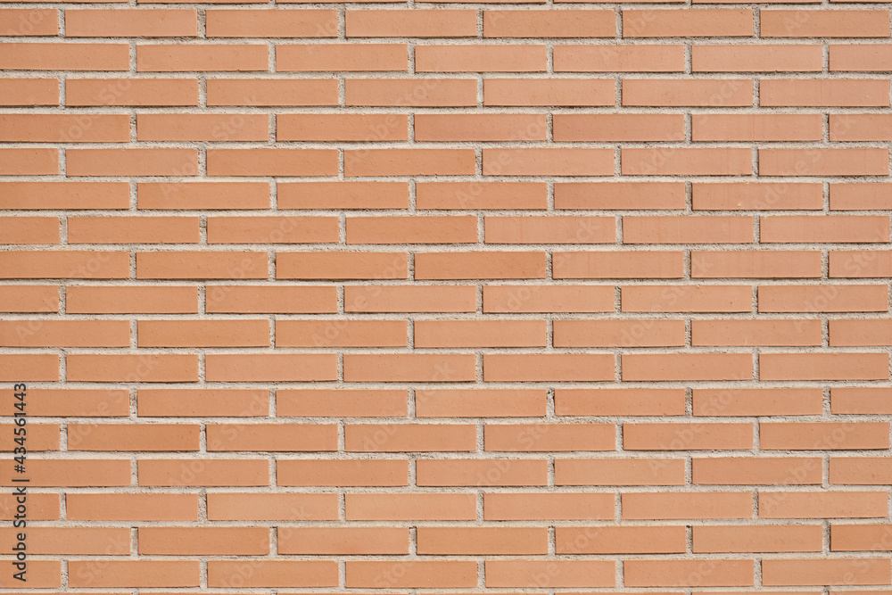 Brick wall with clean orange bricks. Background horizontal texture. Brick wall with clean orange bricks. Background horizontal texture.