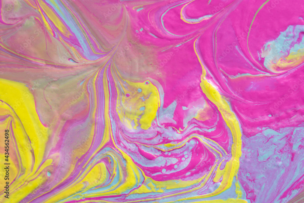 Abstract fluid art texture. A multicolored pictorial fragment of a painting. Bright acrylic drawing of pink, yellow, purple, pale green and blue shades close-up. The concept of summer mood, flower