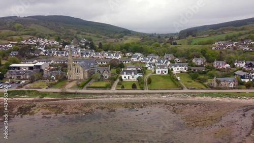 Aerial view of the Scottish town of Lamlash on the Isle of Arran on an overcast day, Scotland. Right to left view of town. photo