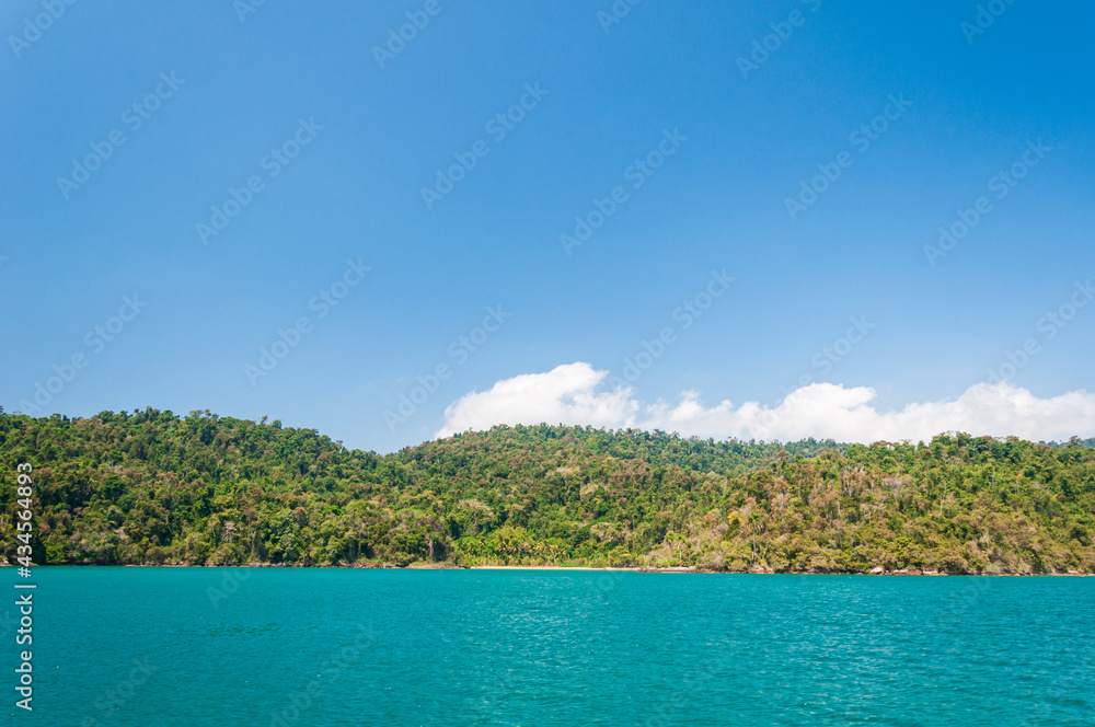 Coastline scenic view with blue sky and sea. Summer vacation day at Paraty's sea. Coastline scenic view with blue sky and sea. Summer vacation day at Paraty's sea.