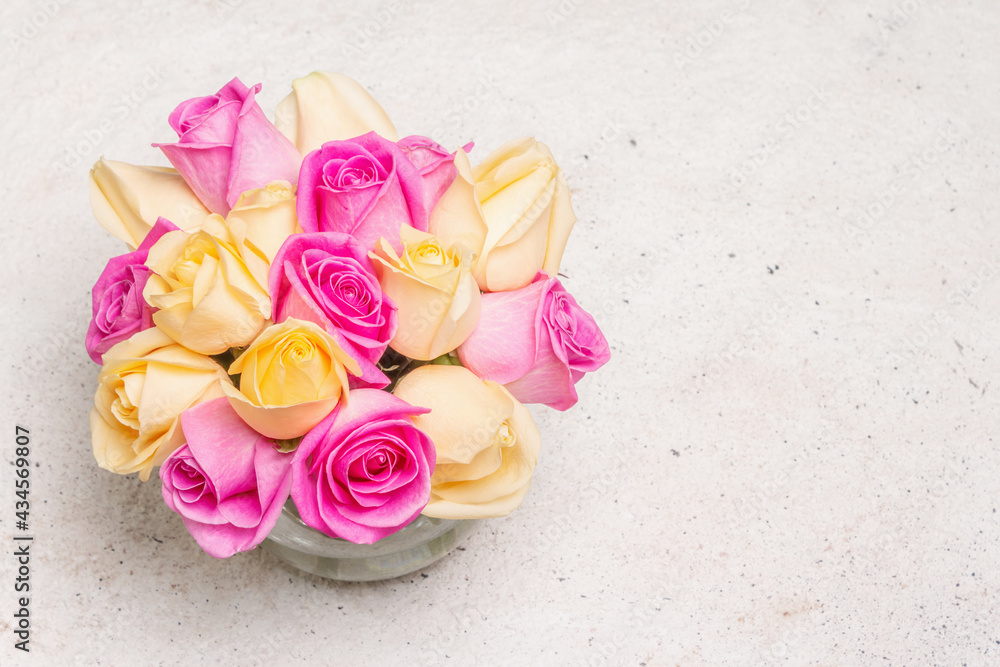 Bouquet of fresh multicolored roses in a vase Bouquet of fresh multicolored roses in a vase