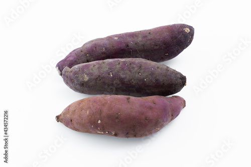 Japanese burned potatoes on white background