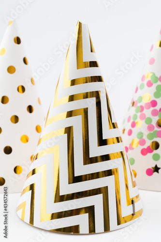 Happy New Year party hat on white background.