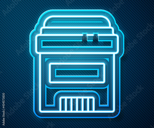 Glowing neon line Antiperspirant deodorant roll icon isolated on blue background. Cosmetic for body hygiene. Vector