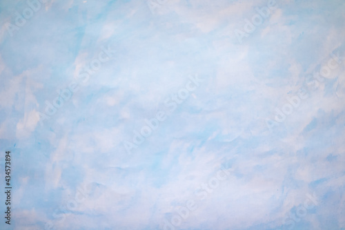 Blue azure hand-drawn background. Watercolor. Sky. Handmade. The texture is in the form of the sky.