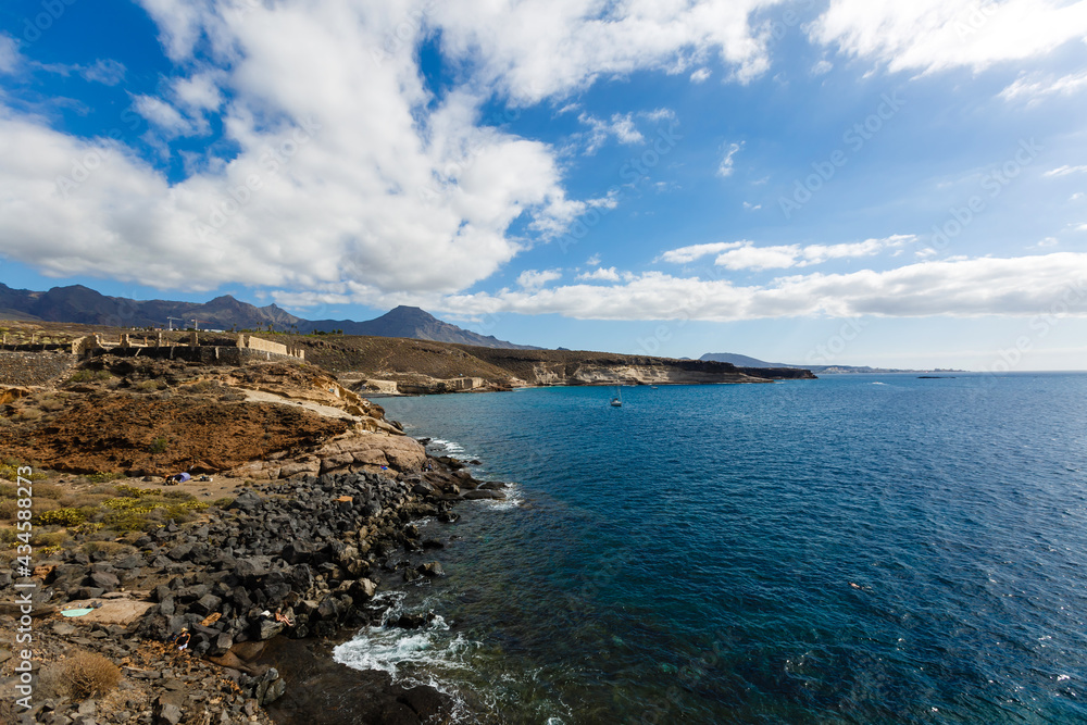 Calm ocean in the morning. ocean shore with stones Calm ocean in the morning. ocean shore with stones