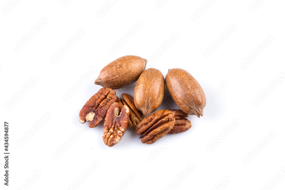 Few pecan nuts isolated on white Few pecan nuts isolated on white