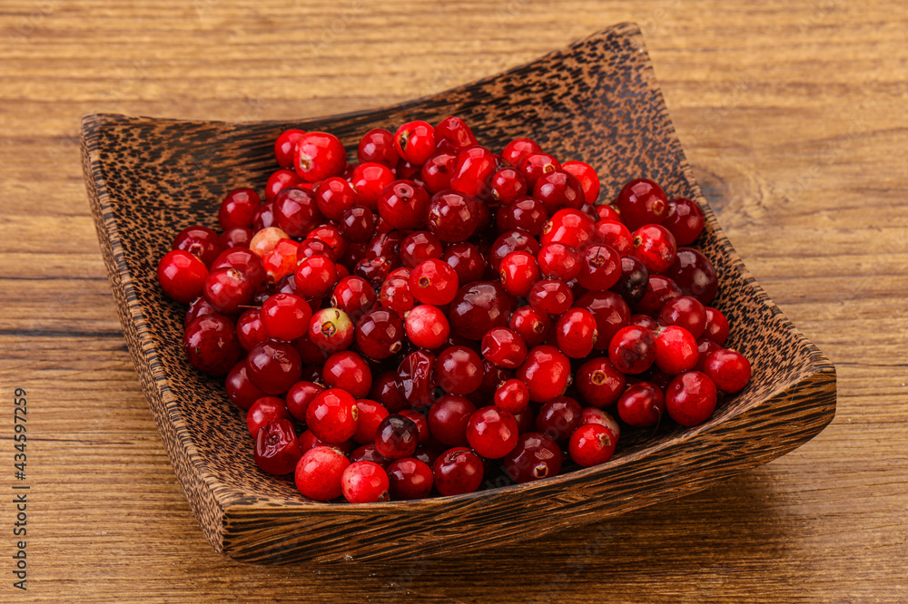 Sweet and tasty cranberry in the bowl Sweet and tasty cranberry in the bowl