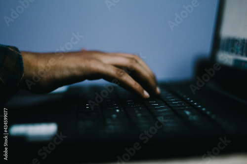 Mockup image of a hand touching on laptop computer touchpad