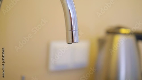 Wallpaper Mural Water dripping from the tap in slow motion 180fps Torontodigital.ca