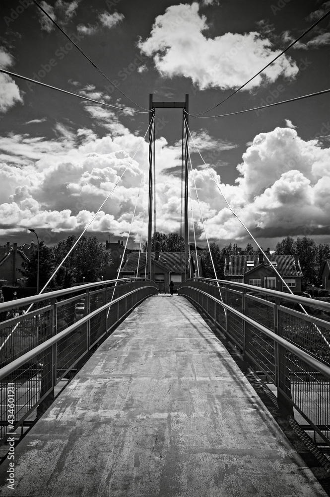 Obraz premium An urban bridge and sky with clouds