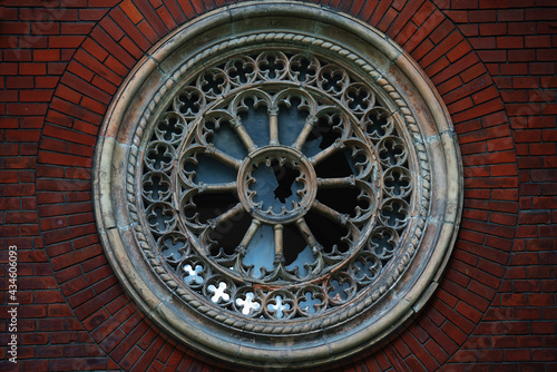 Background of round ancient destroyed window with glass. © zwiebackesser