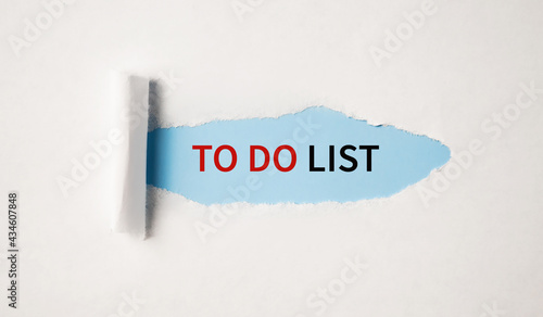 To Do List text appearing behind torn paper. Business photo meaning Series of task to be done organized in priority order.