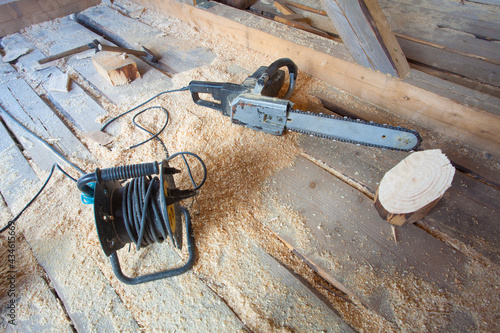 electric chainsaw for wood cutting in construction