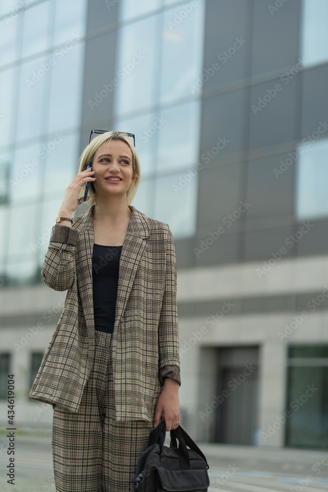 Fototapeta premium Talking on the phone and smiling