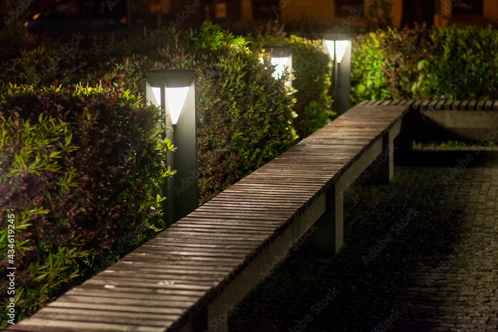 Lamp light in the park, bench