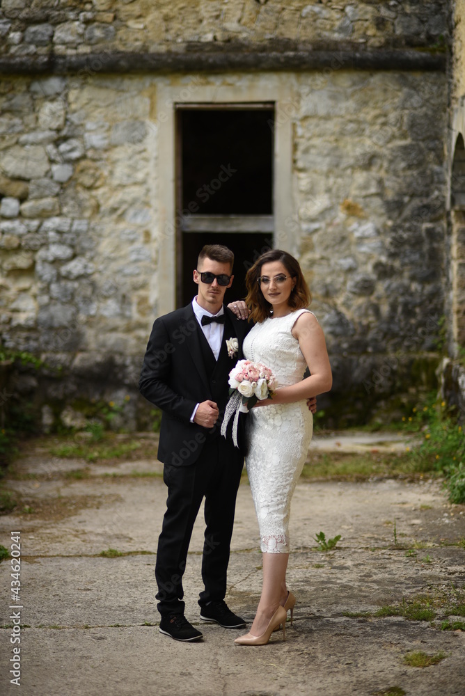 Beautiful wedding couple, Luxury married wedding couple, bride and groom posing in old city Beautiful wedding couple, Luxury married wedding couple, bride and groom posing in old city