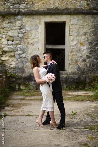Luxury married wedding couple, bride and groom posing in old city