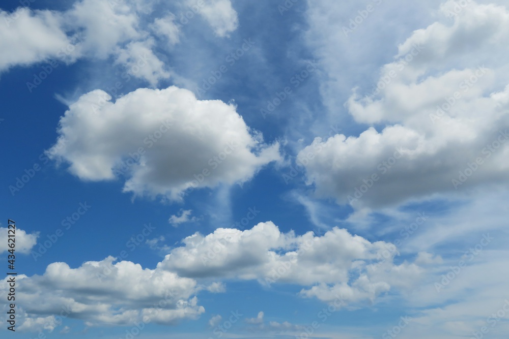 Beautiful blue sky with white fluffy clouds Beautiful blue sky with white fluffy clouds