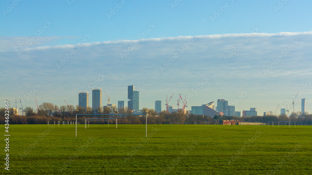 View from Hackney Marshes to Canary Wharf, London, UK