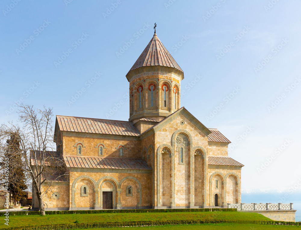 Impressive building of new Cathedral of Agia Nina at Bodbe Convent in foothills of Caucasus Mountains on sunny spring day, Kakheti, Georgia