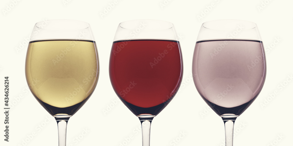 Three glasses of red, white and pink wine, isolated on white background. Wineglass close-up Three glasses of red, white and pink wine, isolated on white background. Wineglass close-up