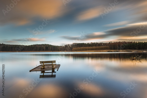 Small woody fishing pier at the lake. © Tomasz Wozniak