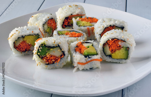 garden roll sushi arranged on a plate