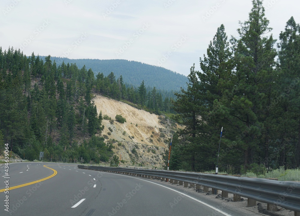Scenic views along a winding paved road Scenic views along a winding paved road