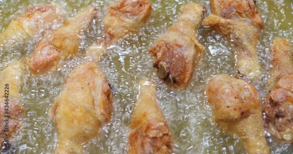 Fried chicken cooking in hot oil Fried chicken cooking in hot oil