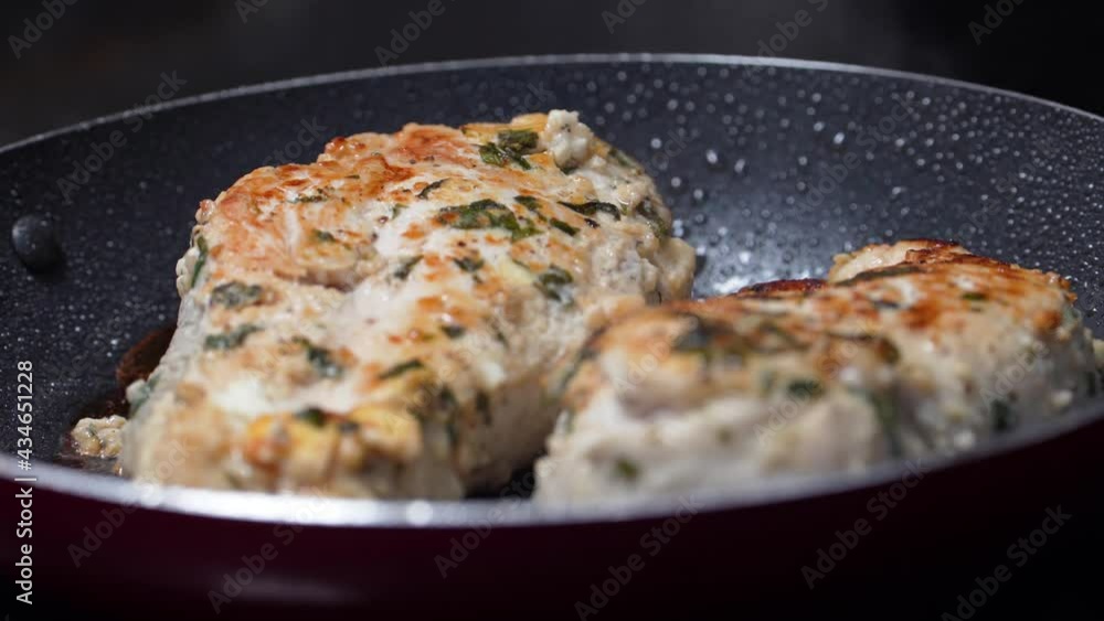 Chicken Breasts Cook and Steam on a Pan Coating the Delicious Dinner