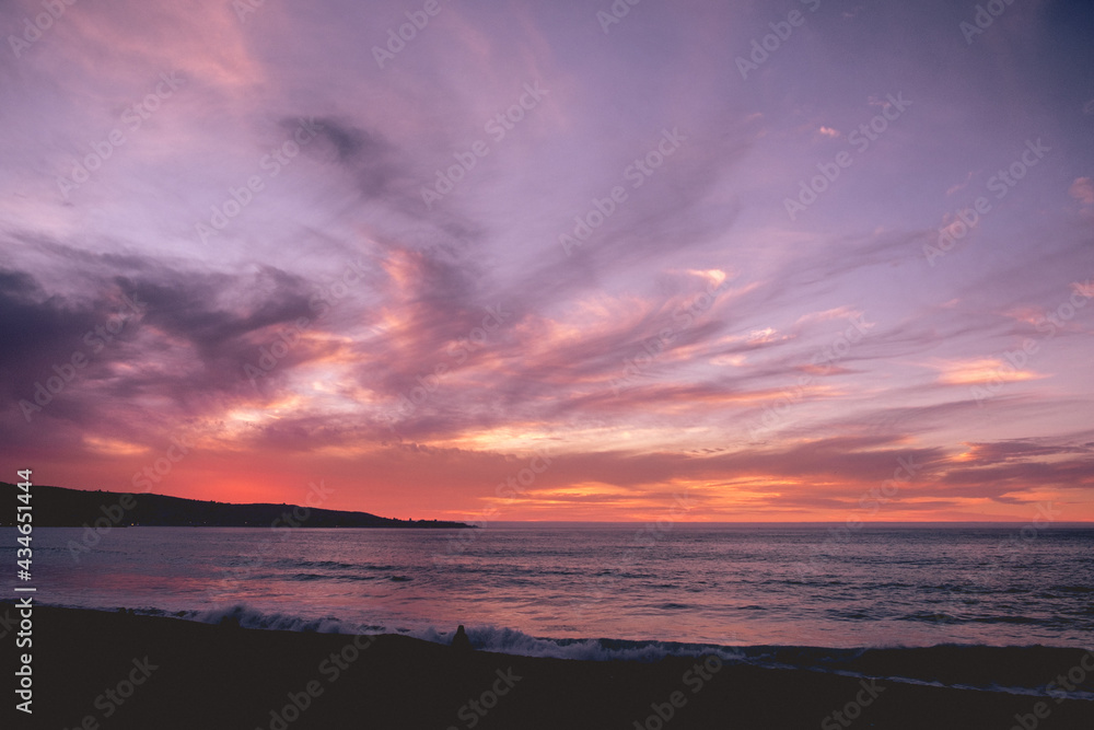 Amazing and beautiful sunset sky with clouds over the ocean, Viña del Mar, Chile