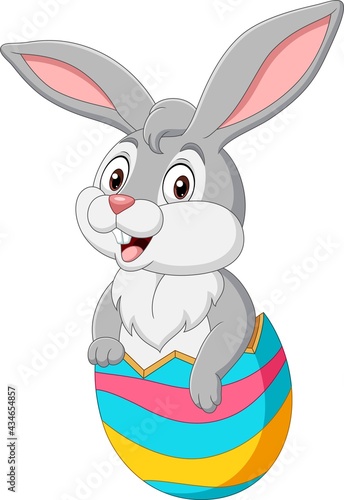 Cartoon bunny come out from an Easter egg